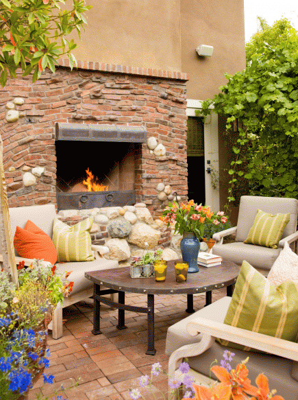Beauty and Warmth Outdoor Fireplace Design with Flowing Lines of Brick and Stone