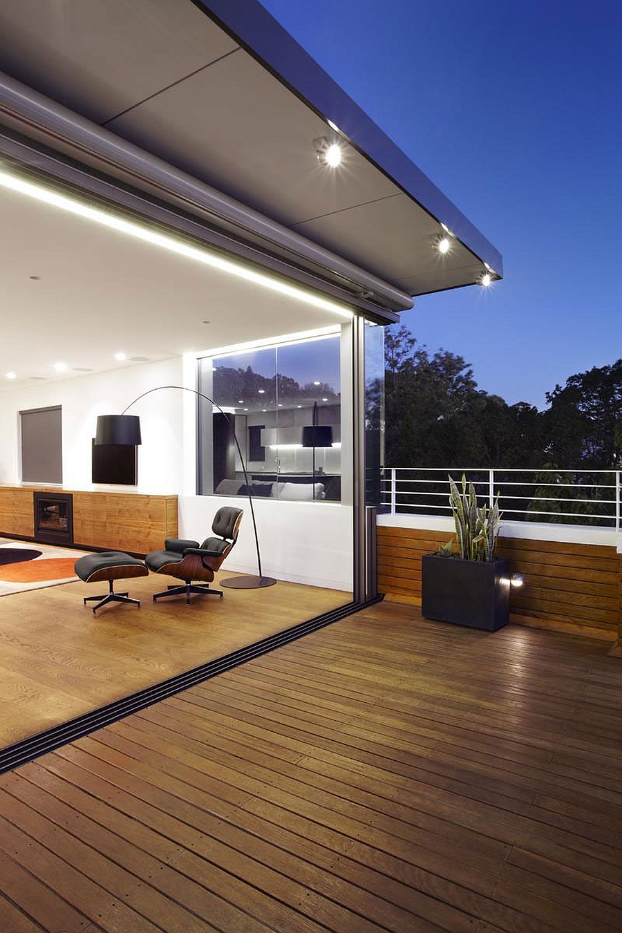 Hill Apartment in Sydney Wooden Deck Flooring in Terrace and Glass Sliding Door