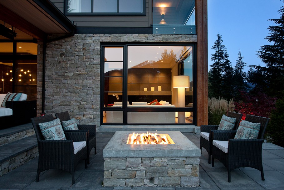 Square Fire Pit and Rattan Chairs on Grey Stone Floor