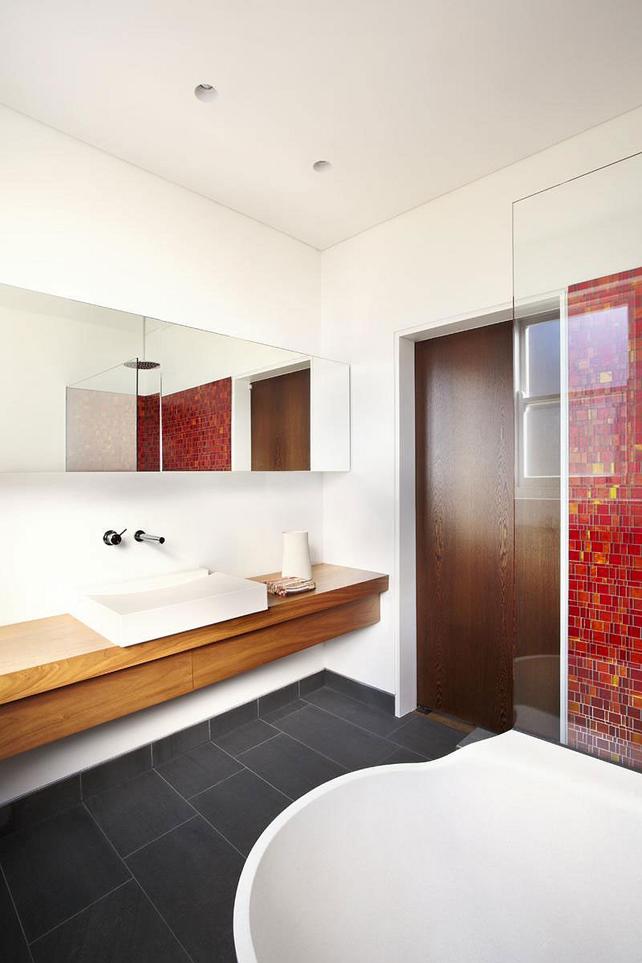 Wood with Concrete Tile Flooring and Red Mosaic Wall Decorations