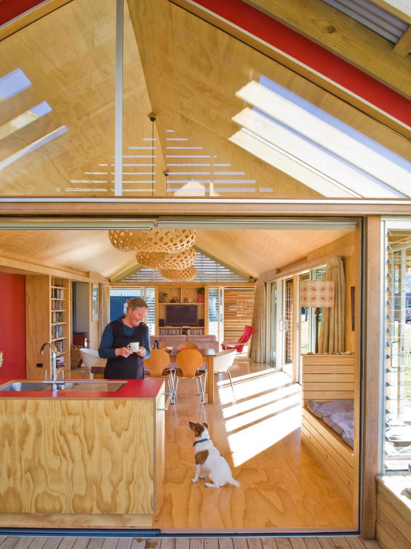 Wooden Kitchen and Minimalist Dining Area under Wooden Ceiling