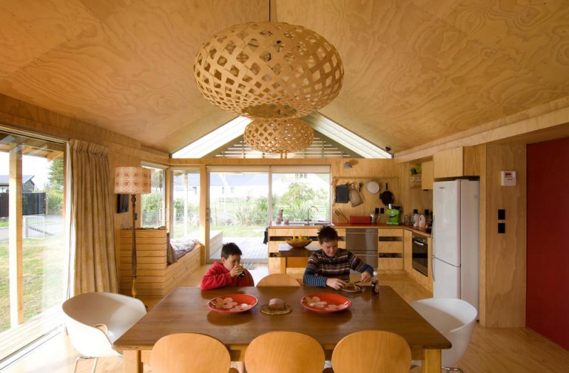 Wooden Table and Wooden Chairs under Brown Lamps