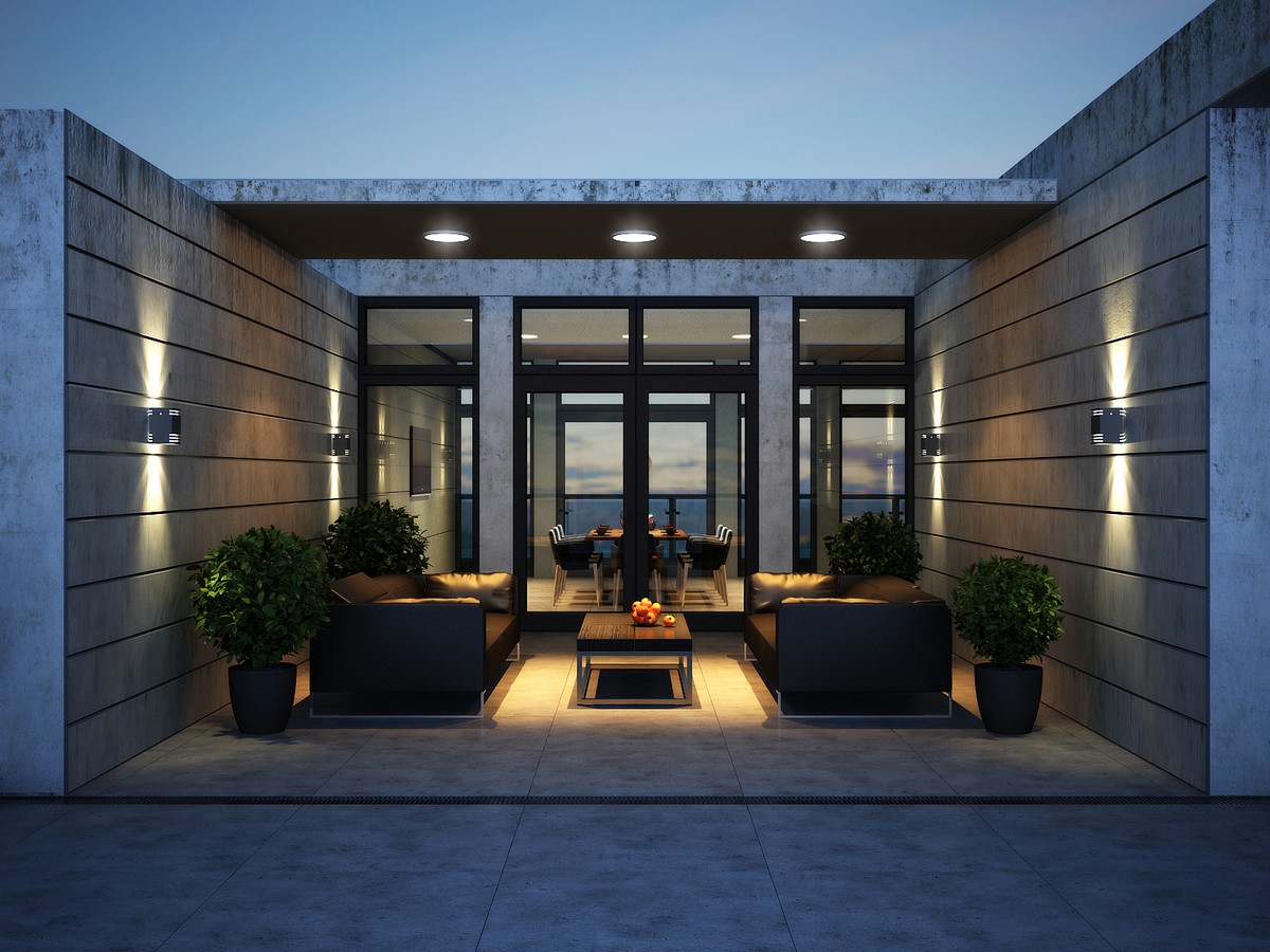 Apartment Terrace with Long Black Sogas and Low Table between it