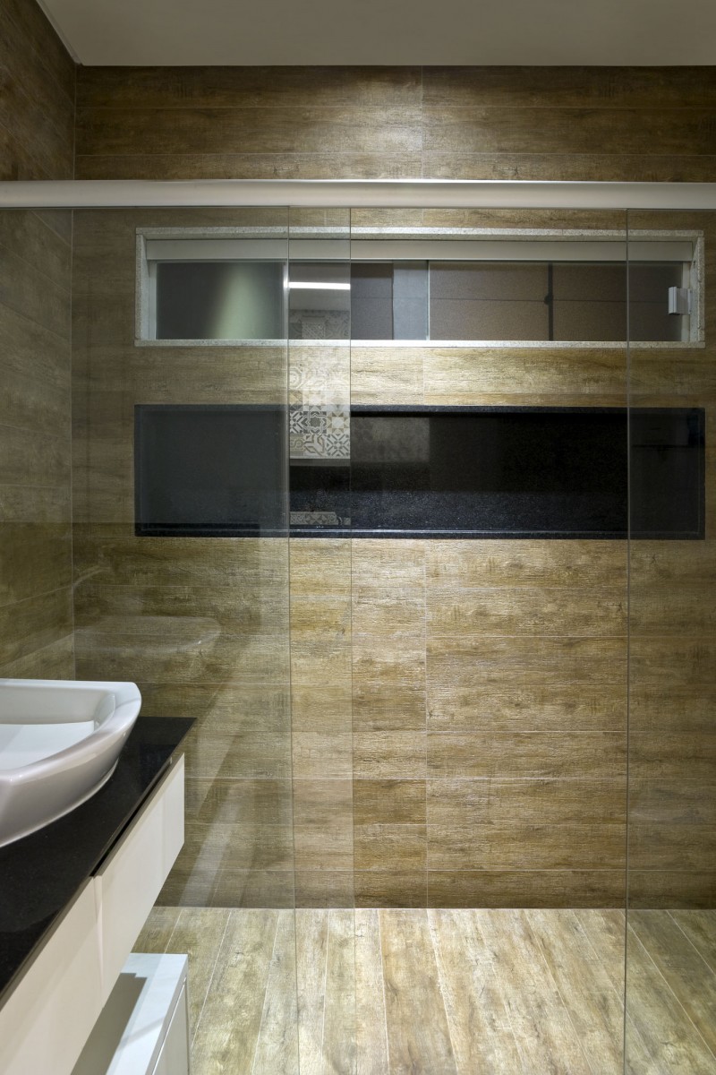 Bathroom with White Vanity and Black Countertop under White Sink