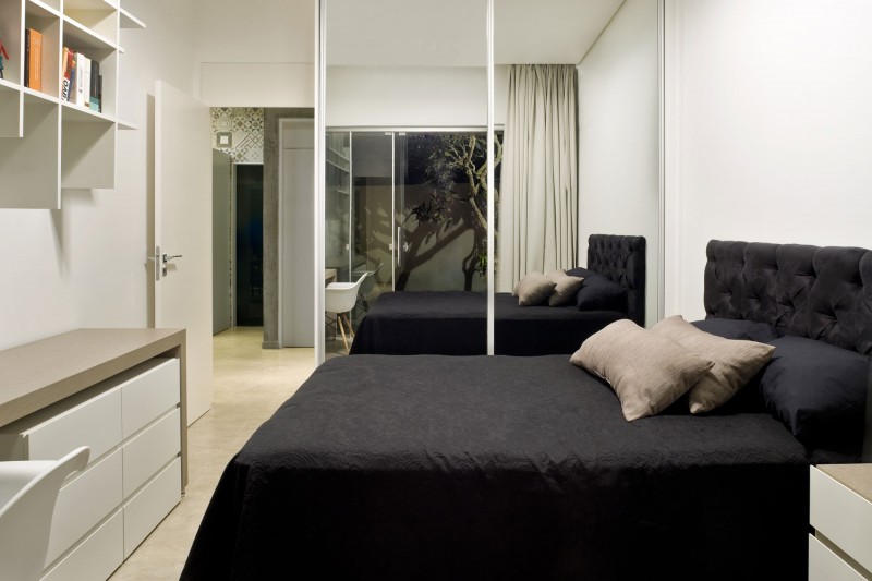 Bedroom with White Desk near the White Chair