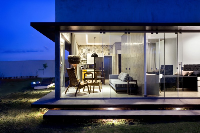 House seen from the Wide Glass Walls and a Bright Lighting