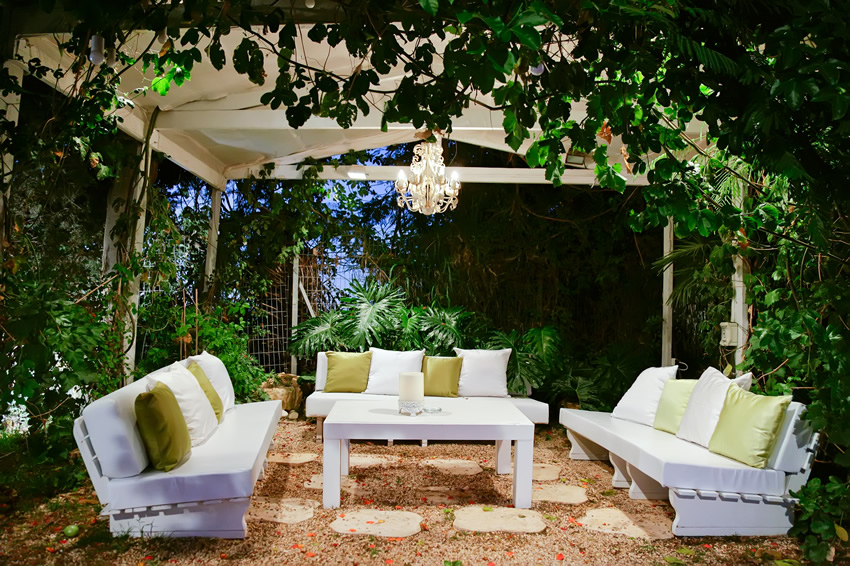 Romantic White Patio Area with Couches Canopy