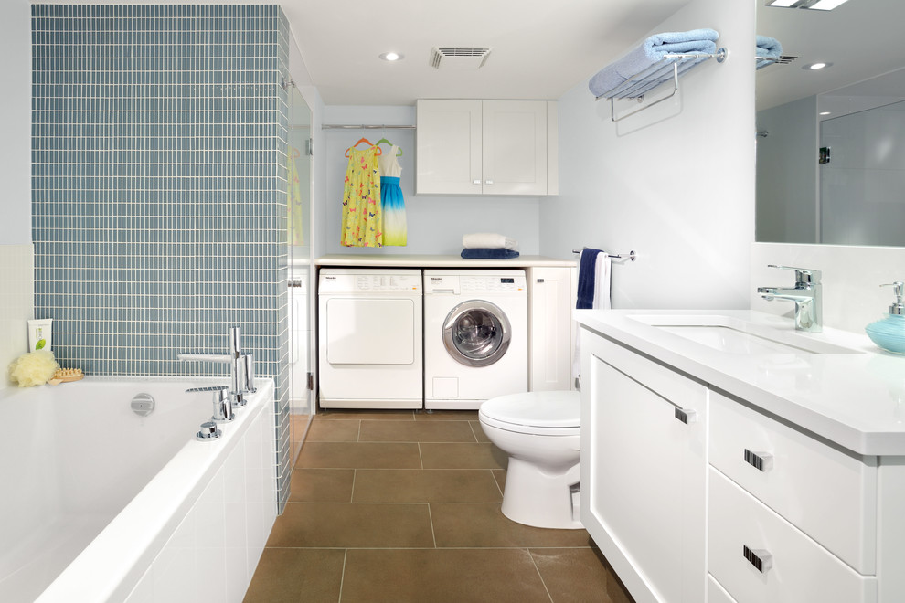 White Accent Basement Bathroom with Hanging Rod Laundry- Storage White Accent Basement Bathroom with Hanging Rod Laundry- Storage