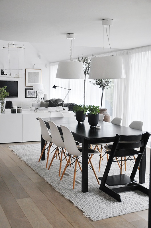 Black and White DIning Room with Modern Light Fixture