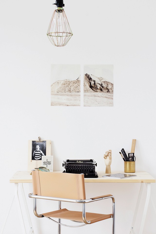 Soft leather desk chair in a small, bright office space