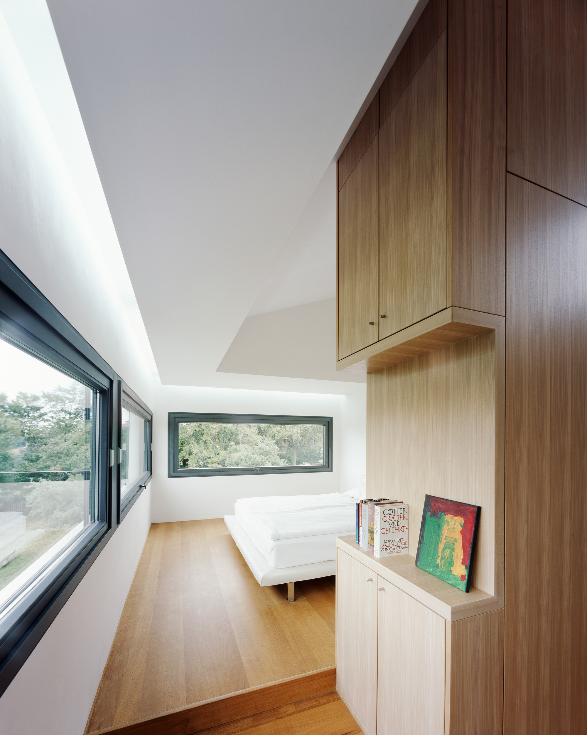 Bedroom Area Among Hardwood Flooring under House Anna Philipp under That Wooden Storage Showed Books Area Bedroom Area Among Hardwood Flooring under House Anna Philipp under That Wooden Storage Showed Books Area