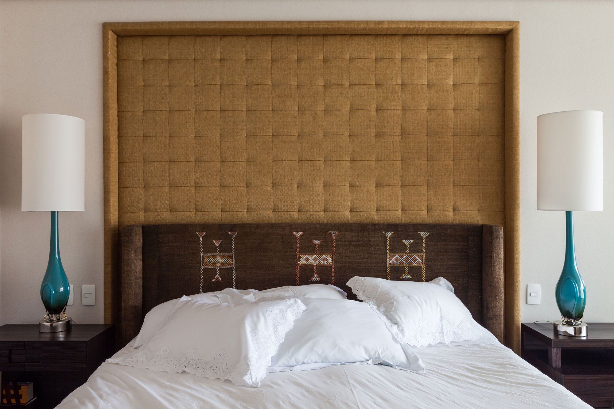 Brown Patterned Headboard Also Tufted Panel Completed Among Sleek Black Nightstands With Lamps