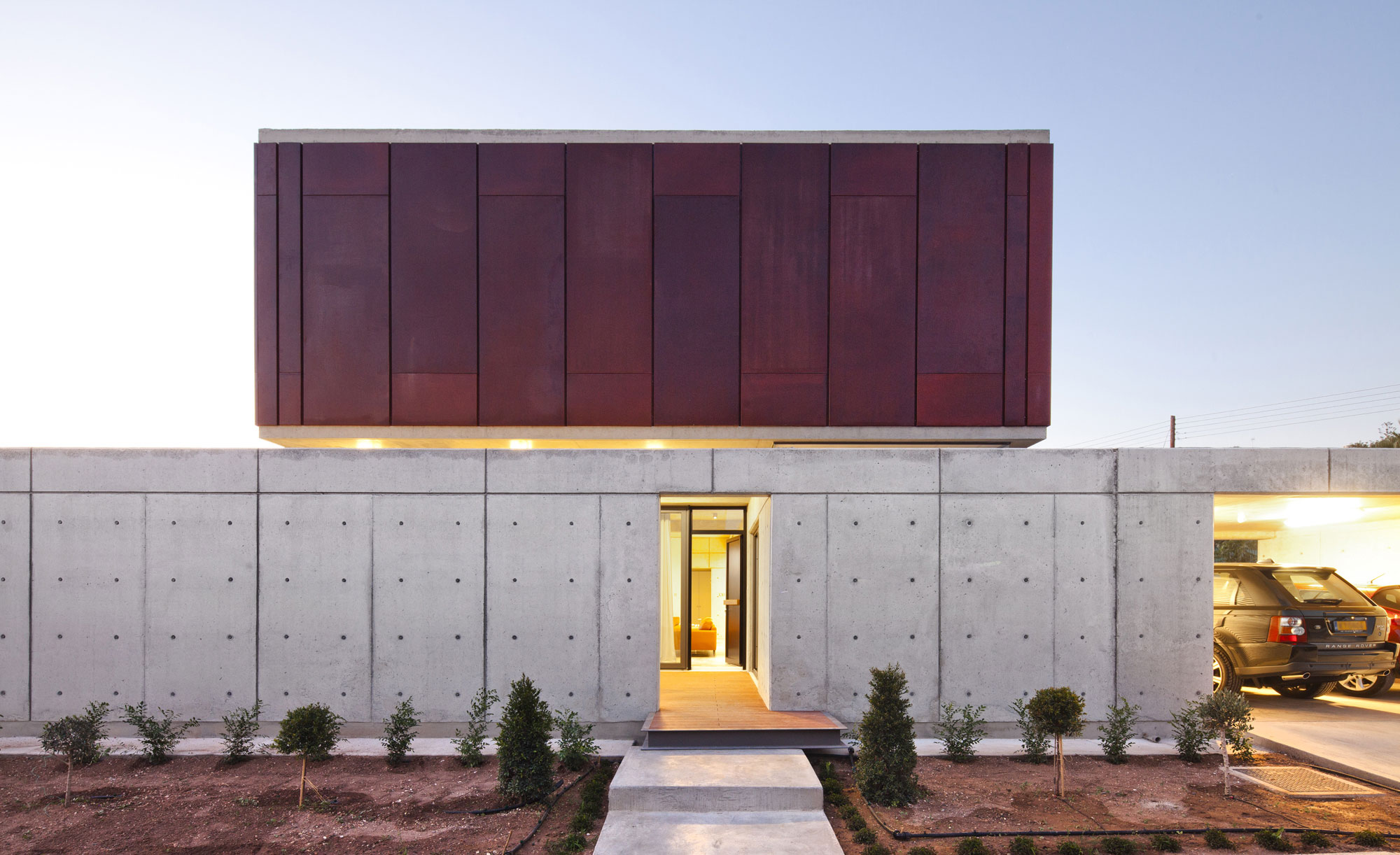 Andri & Yiorgos Residence - Wall Which Is Made From Concrete Blocks Bright Lighting Also Green Plants Garden Andri & Yiorgos Residence - Wall Which Is Made From Concrete Blocks Bright Lighting Also Green Plants Garden