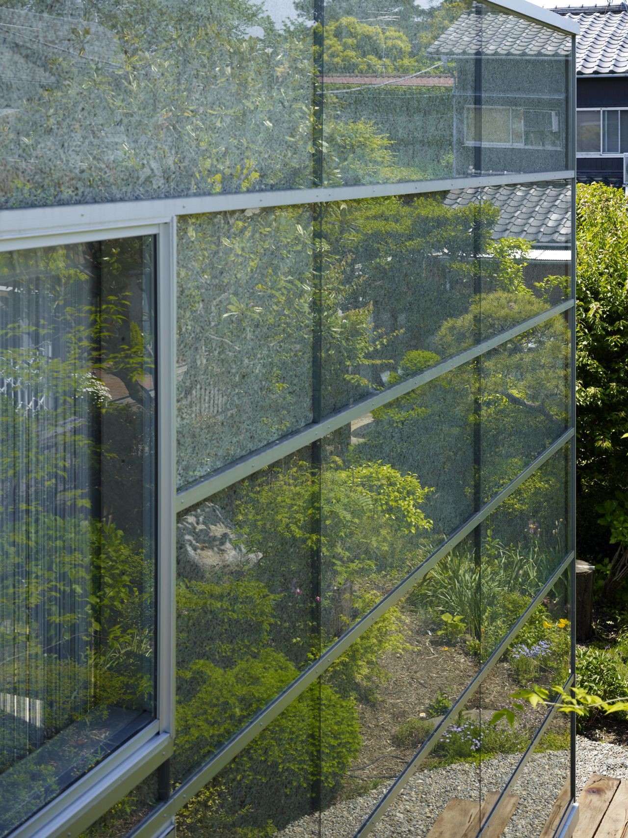 Clean Lining Attached Over Transparency On Garden House Exterior Wall Near Frames Along Near Sheer Curtain Covering It Clean Lining Attached Over Transparency On Garden House Exterior Wall Near Frames Along Near Sheer Curtain Covering It