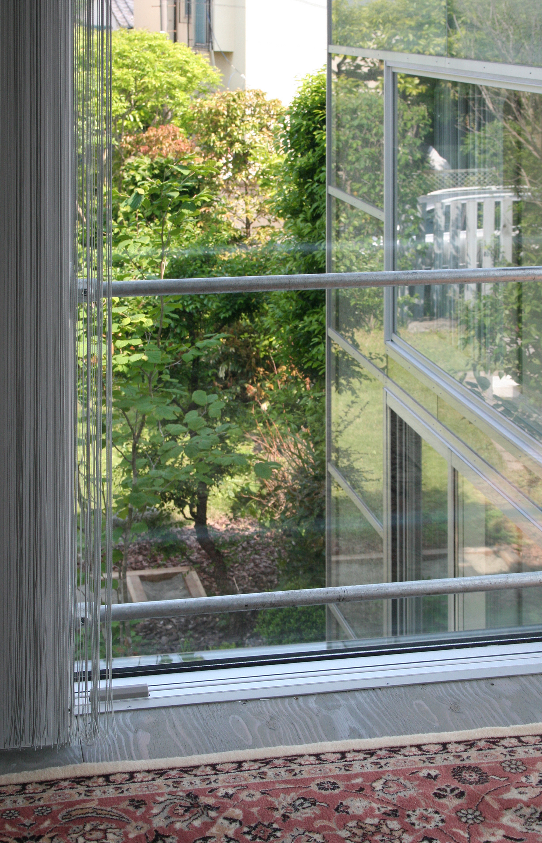 Leafy Trees Growing Naturally Around Home Enjoyed From Garden House Upper Floor Through Glass Wall Leafy Trees Growing Naturally Around Home Enjoyed From Garden House Upper Floor Through Glass Wall