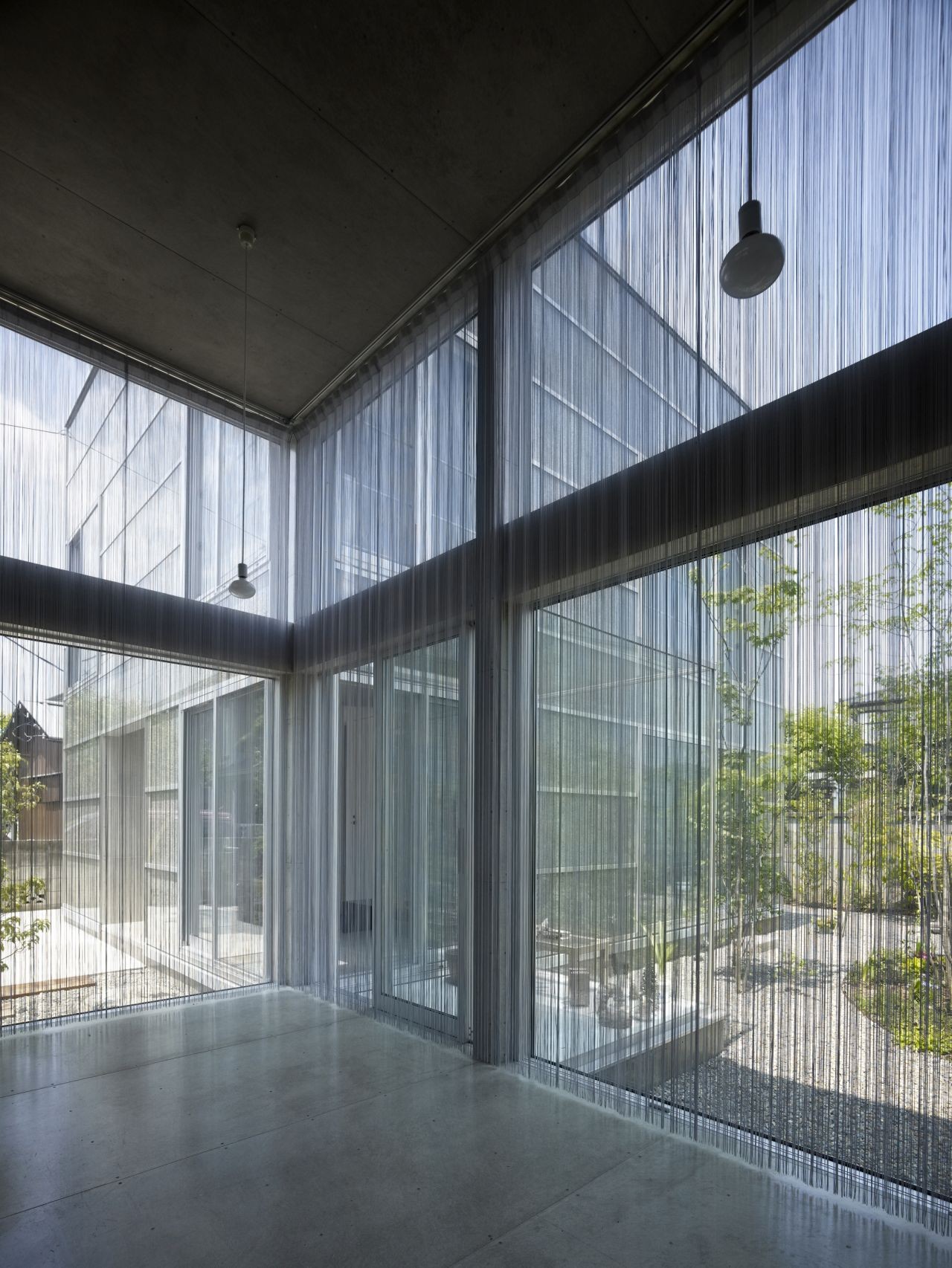 Shady Look Of Garden House Interior Near Double Height Ceiling Concept Covered Aside Sheer Curtain For Privacy Shady Look Of Garden House Interior Near Double Height Ceiling Concept Covered Aside Sheer Curtain For Privacy