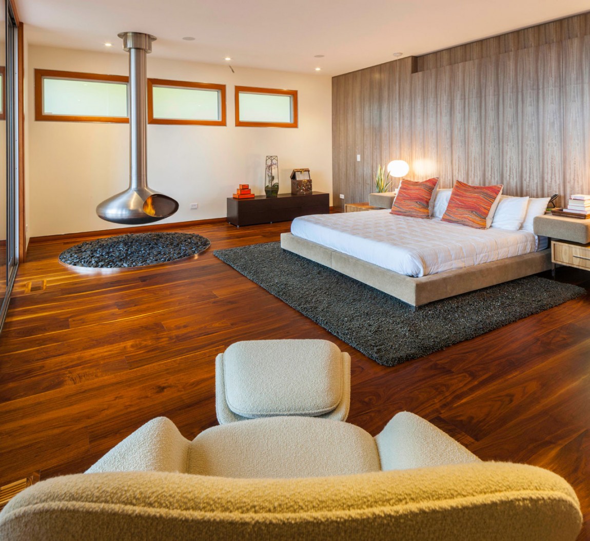 Bedroom Decoration with Colorful Pillows On Clear Bed On Wooden Floor Bedroom Decoration with Colorful Pillows On Clear Bed On Wooden Floor