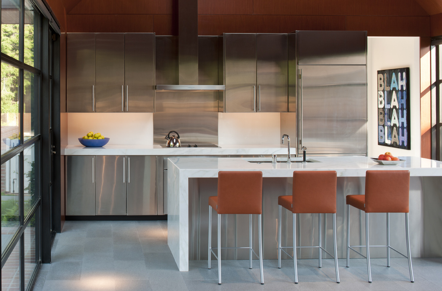 Brown Colored Back Stools Which Have Silver Stainless Feet Along With Clear Countertop Brown Colored Back Stools Which Have Silver Stainless Feet Along With Clear Countertop