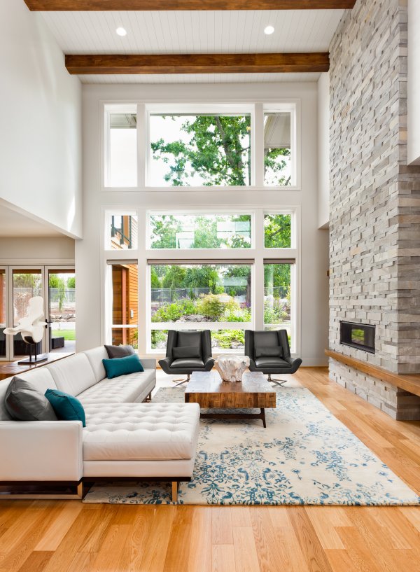Contemporary and Midcentury modern themes with gorgeous walls of windows and an asymmetric deign