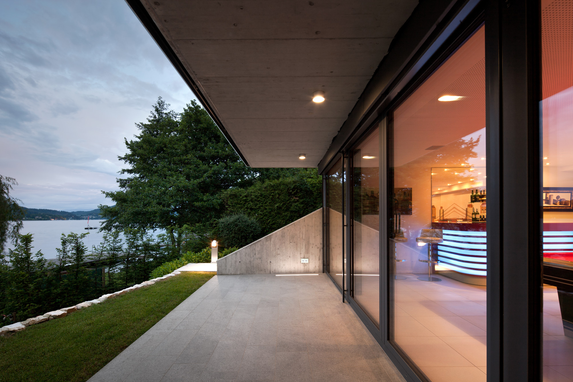 Granite Floor Connected To Green Lawn On Courtyard Granite Floor Connected To Green Lawn On Courtyard