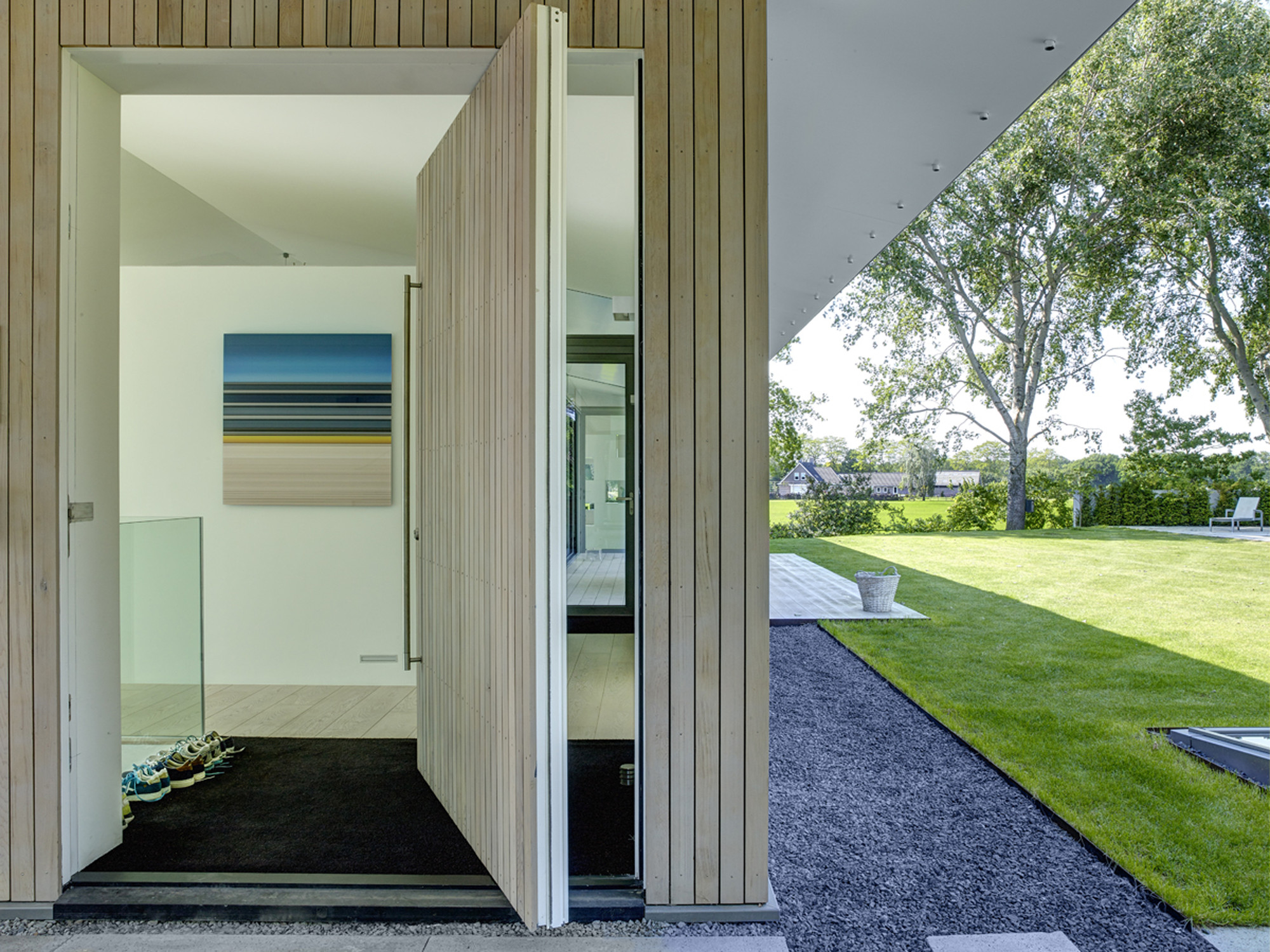 House Near Comfy Clear Colored Rotating Door Which Is Made From Wooden Material House Near Comfy Clear Colored Rotating Door Which Is Made From Wooden Material