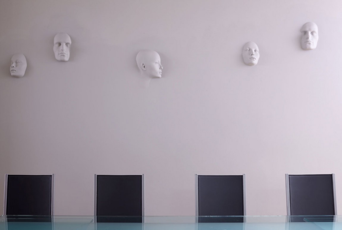Human Head Ornament On Clear Wall Background Added Near Small Space Human Head Ornament On Clear Wall Background Added Near Small Space