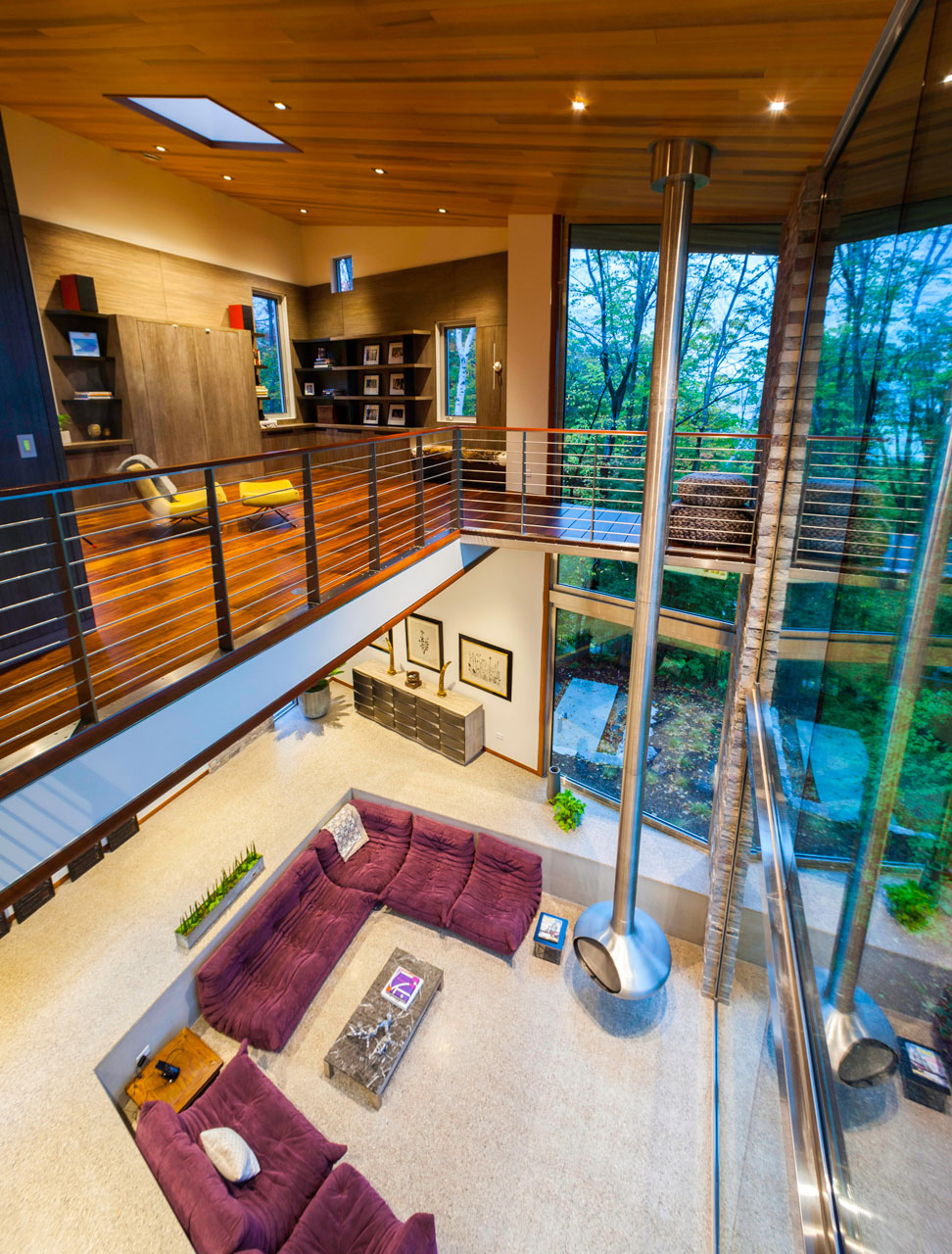 Living Room with Purple Sofa and Glass Table as Decoration Living Room with Purple Sofa and Glass Table as Decoration