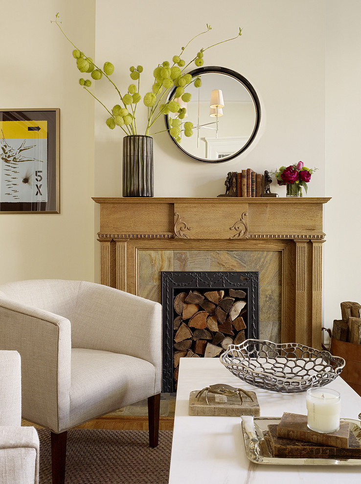Mantel decorating with fresh flowers in tall vases