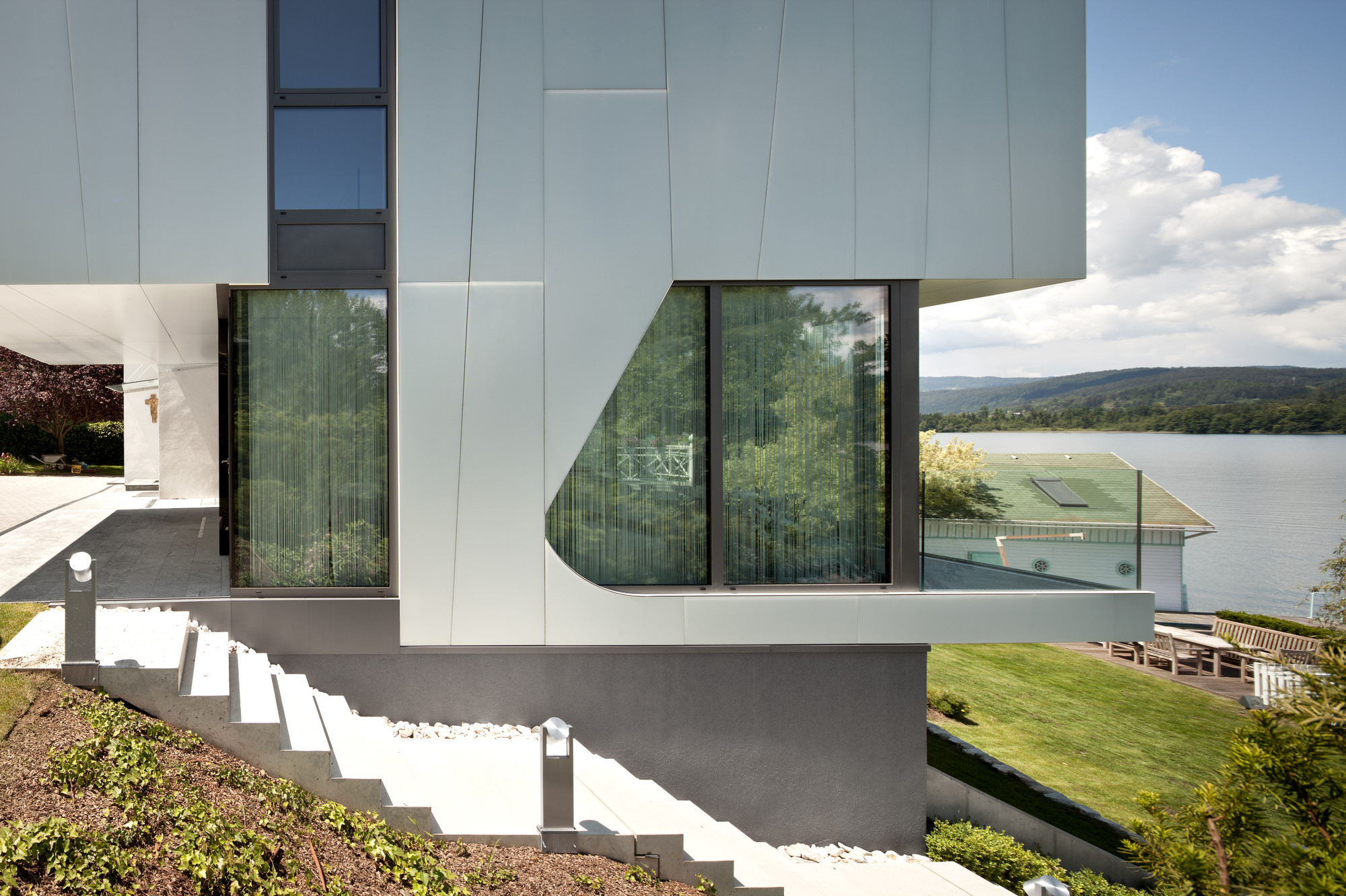 Outdoor Staircase Use Glass Balustrade Along With Rustic Landscape Beside It Outdoor Staircase Use Glass Balustrade Along With Rustic Landscape Beside It