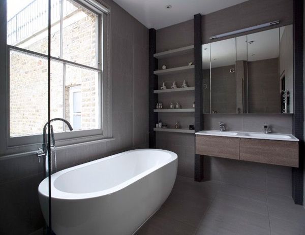Oval Bathtub Added Near Metallic Water Faucet On Floor Near Bay Window Oval Bathtub Added Near Metallic Water Faucet On Floor Near Bay Window