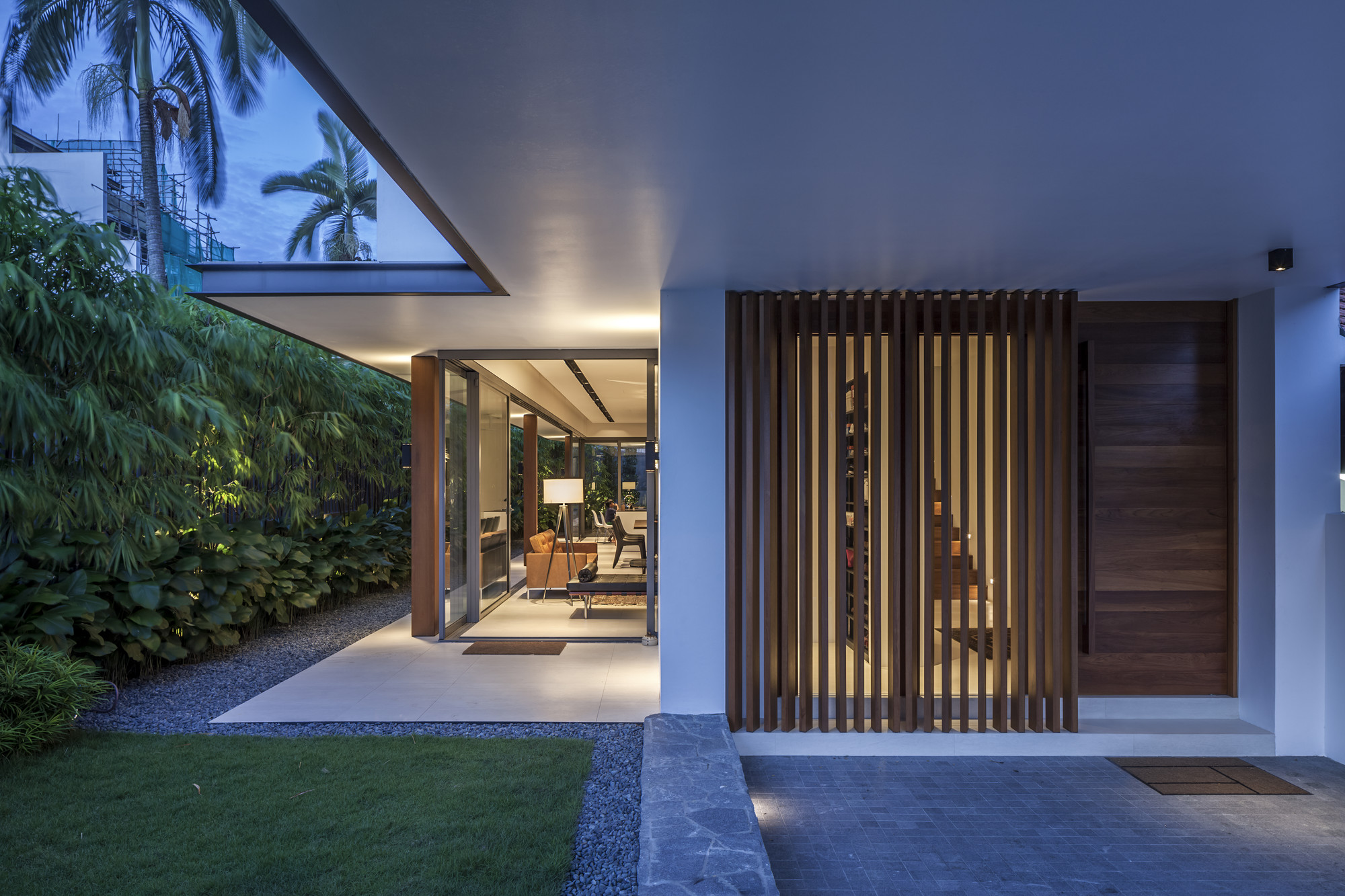 Sunny Side House by Wallflower Architecture + Design - Light Brown Colored Wooden Door Along With Bright Cream Lighting Inside Sunny Side House by Wallflower Architecture + Design - Light Brown Colored Wooden Door Along With Bright Cream Lighting Inside