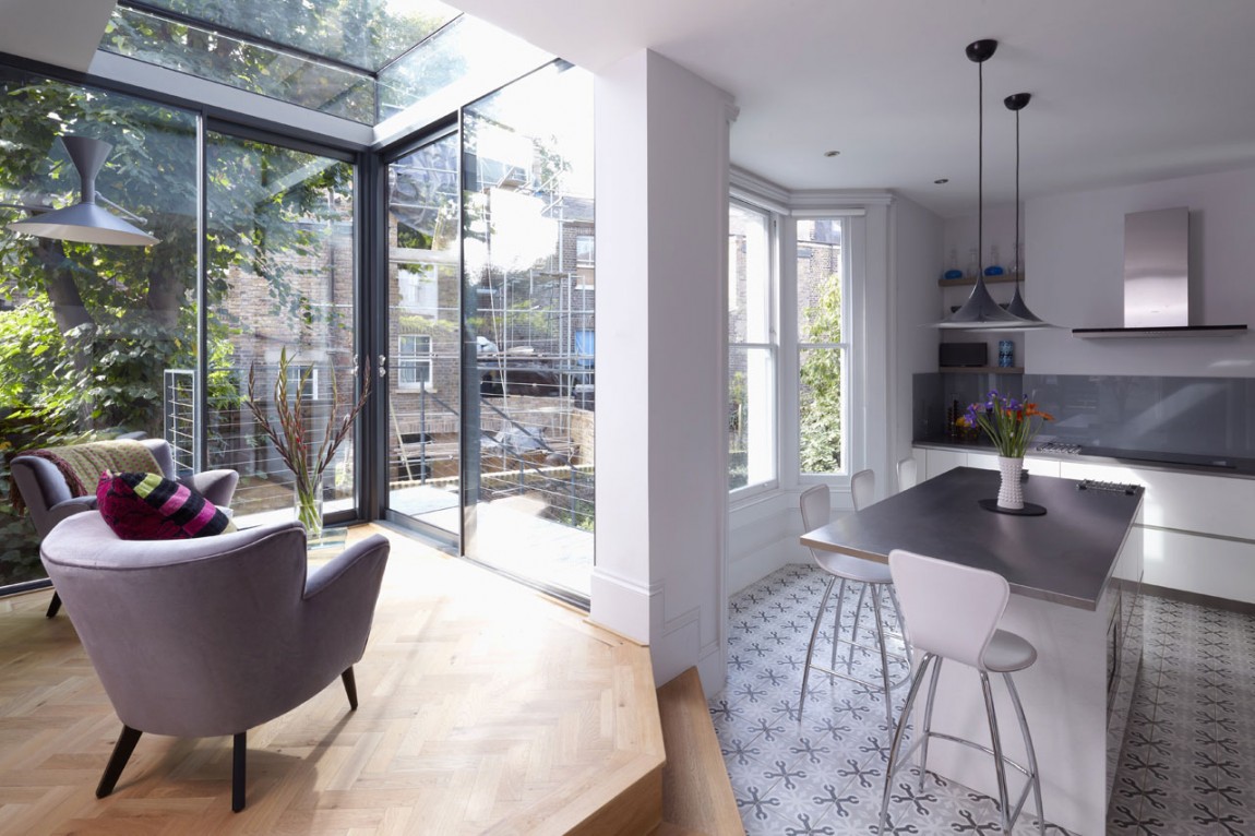 Vase Of Flower On Glossy Grey Countertop Of Kitchen Bar On Wooden Floor Vase Of Flower On Glossy Grey Countertop Of Kitchen Bar On Wooden Floor