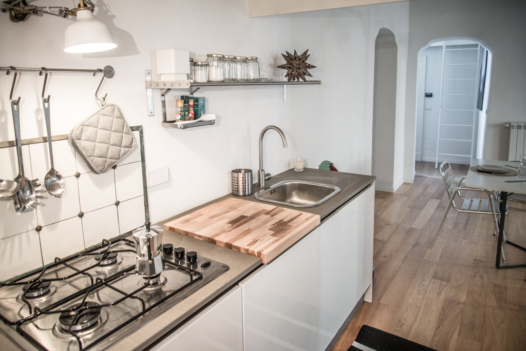 Via delle Orfane by CON3STUDIO - Sink Along With Metallic Water Faucet On Glossy Clear Dresser On Floor Via delle Orfane by CON3STUDIO - Sink Along With Metallic Water Faucet On Glossy Clear Dresser On Floor