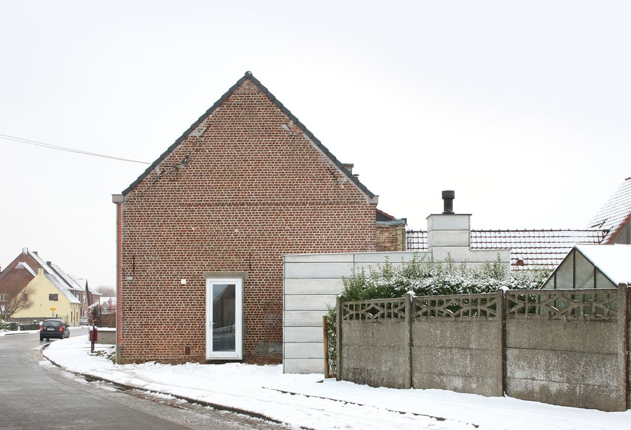 House H by Architecten de Vylder Vinck Taillieu - Chic Clear Glass Door Installed On Maroon Brick Wall Near Attic Roof House H by Architecten de Vylder Vinck Taillieu - Chic Clear Glass Door Installed On Maroon Brick Wall Near Attic Roof
