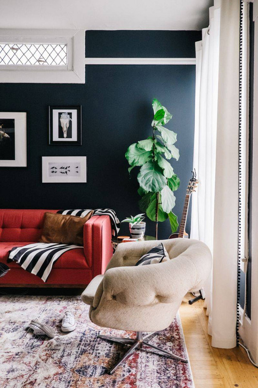Navy red living room with black wall