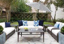16 Modern Garden dan Patio Furniture Decoration Ideas 2021 Gray Wicker Outdoor Sofa with Black and White Striped Umbrella